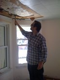 Nick took a hammer to the ceiling about 15 minutes after we closed. It was thrilling!